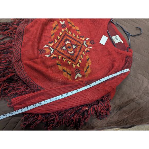 Southwestern style rust colored sweater with fringe detailing by Cotton & Rye - Picture 7 of 8